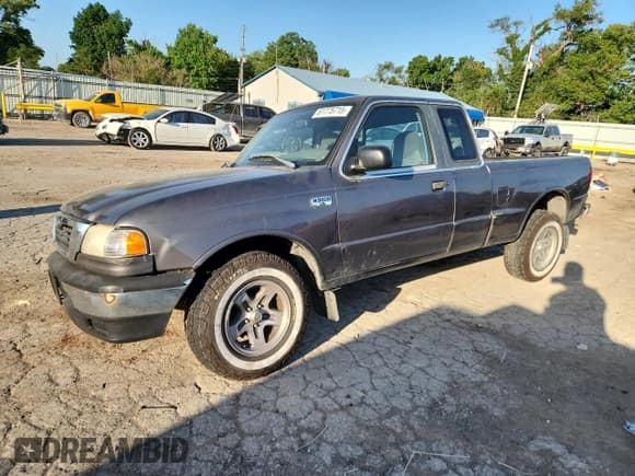 ✅ 2000 Mazda B-Series SE • VIN: 4F4YR16V0YTM26919 • Lot: 61775715. Listed on Copart with 218,184 mi. Free auction sales archive from the USA and detailed vehicle history report at DreamBid. Image 1.