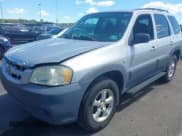 ✅ 2006 Mazda Tribute i • VIN: 4F2YZ02Z86KM08764 • Lot: 43079690. Listed on IAAI with 207,691 mi. Free auction sales archive from the USA and detailed vehicle history report at DreamBid. Image 2.