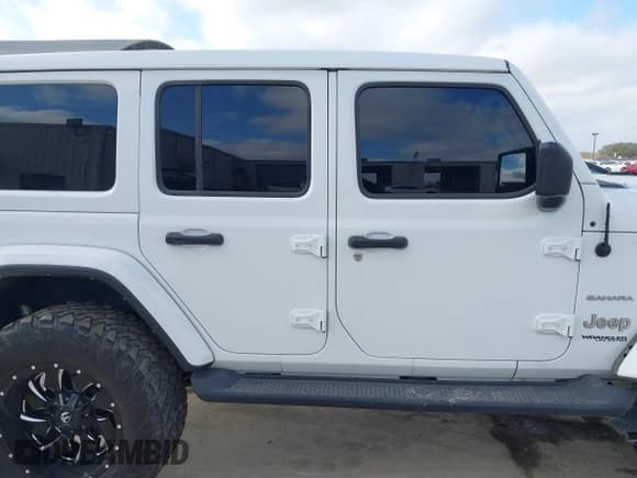 ✅ 2021 Jeep Wrangler Unlimited Sahara • VIN: 1C4HJXEN3MW717895 • Lot: 41472929. Listed on IAAI with 58,001 mi. Free auction sales archive from the USA and detailed vehicle history report at DreamBid. Image 13.