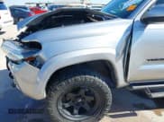 ✅ 2019 Toyota Tacoma SR5 • VIN: 5TFAZ5CN8KX077501 • Lot: 43590703. Listed on IAAI with 50,518 mi. Free auction sales archive from the USA and detailed vehicle history report at DreamBid. Image 18.