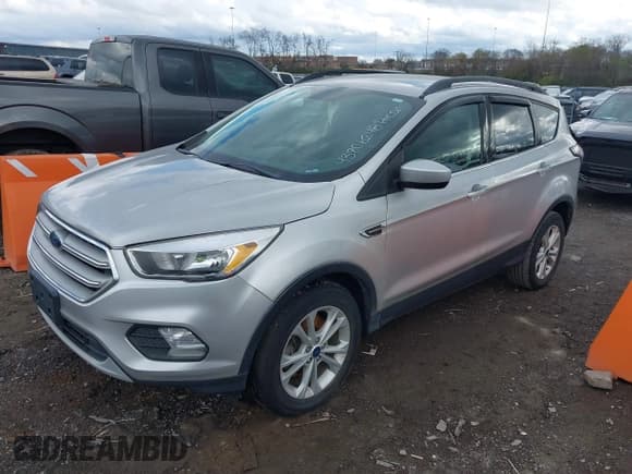 ✅ 2018 Ford Escape SE • VIN: 1FMCU9GDXJUB61928 • Лот: 43806248. Опубликован ранее на IAAI с пробегом 196 919 миль. Бесплатный доступ к архиву аукционных продаж из США и подробный отчёт об истории автомобиля на DreamBid. Изображение 17.