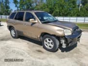 ✅ 2004 Hyundai Santa Fe GLS • VIN: KM8SC13E14U618502 • Lot: 53357435. Listed on Copart with 160,672 mi. Free auction sales archive from the USA and detailed vehicle history report at DreamBid. Image 4.