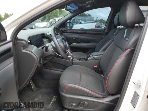 ✅ 2023 Hyundai Tucson N Line • VIN: KM8JF3AE0PU211910 • Lot: 71085664. Wystawiony na Copart z przebiegiem 26 849 mil. Bezpłatny archiwum sprzedaży aukcyjnych z USA i szczegółowy raport historii pojazdu na DreamBid. Zdjęcie 7.