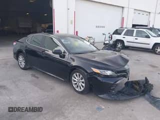 2019 Toyota Camry LE z VIN 4T1B11HK7KU258086, wystawiony jako IAAI lot #42436658 z przebiegiem 130 729 mil mil oraz . Historia ofert i sprzedaży dostępna na DreamBid. Obrazek 1.
