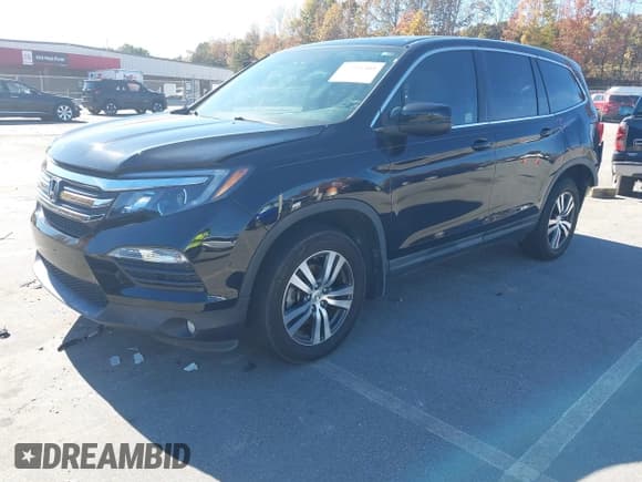 ✅ 2017 Honda Pilot EX-L • VIN: 5FNYF6H51HB033722 • Lot: 43594503. Listed on IAAI with 146,016 mi. Free auction sales archive from the USA and detailed vehicle history report at DreamBid. Image 17.