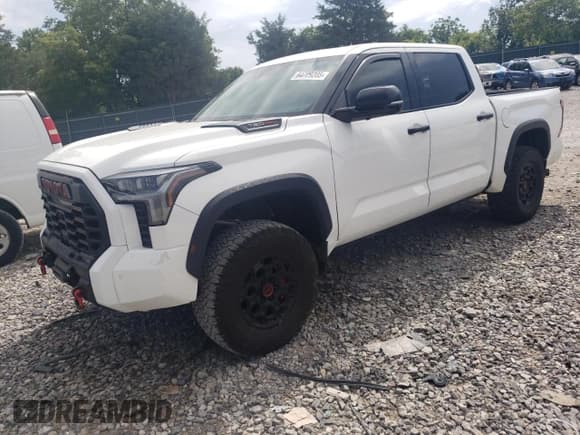 ✅ 2023 Toyota Tundra TRD Pro Hybrid • VIN: 5TFPC5DB9PX027956 • Lot: 64729205. Listed on Copart with 50,417 mi. Free auction sales archive from the USA and detailed vehicle history report at DreamBid. Image 1.