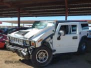 ✅ 2003 Hummer H2 • VIN: 5GRGN23U33H115738 • Lot: 42234560. Listed on IAAI with Not provided. Free auction sales archive from the USA and detailed vehicle history report at DreamBid. Image 6.
