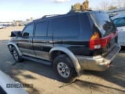✅ 1999 Mitsubishi Montero Sport LS • VIN: JA4LS31H5XP006983 • Lot: 88288455. Wystawiony na Copart z przebiegiem 161 647 mil. Bezpłatny archiwum sprzedaży aukcyjnych z USA i szczegółowy raport historii pojazdu na DreamBid. Zdjęcie 2.