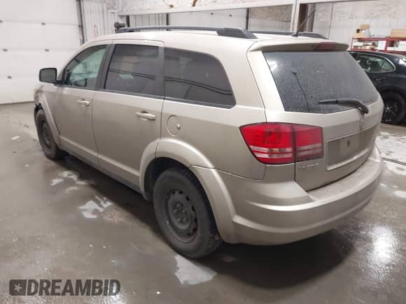 2009 Dodge Journey SE z VIN 3D4GG47B99T561583, wystawiony jako IAAI lot #43402002 z przebiegiem 137 189 mil mil oraz . Historia ofert i sprzedaży dostępna na DreamBid. Obrazek 3.