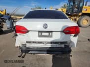 ✅ 2014 Volkswagen Jetta SE • VIN: 3VWD17AJ2EM289009 • Lot: 84212895. Listed on Copart with 91,991 mi. Free auction sales archive from the USA and detailed vehicle history report at DreamBid. Image 6.