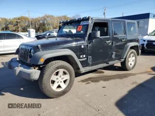 ✅ 2009 Jeep Wrangler Unlimited X • VIN: 1J4GA39109L766079 • Лот: 92519755. Опубликован ранее на Copart с пробегом 275 706 миль. Бесплатный доступ к архиву аукционных продаж из США и подробный отчёт об истории автомобиля на DreamBid. Изображение 1.