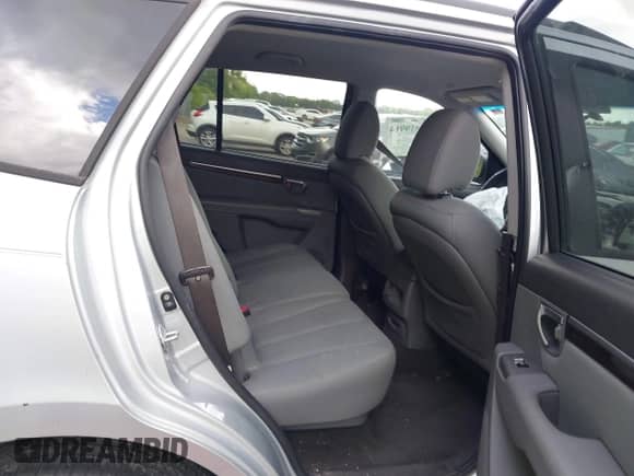 2010 Hyundai Santa Fe GLS z VIN 5NMSG3AB5AH410865, wystawiony jako IAAI lot #43519914 z przebiegiem Nie podano mil oraz . Historia ofert i sprzedaży dostępna na DreamBid. Obrazek 8.