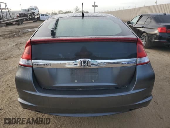 ✅ 2012 Honda Insight • VIN: JHMZE2H32CS000284 • Lot: 50160335. Listed on Copart with 64,074 mi. Free auction sales archive from the USA and detailed vehicle history report at DreamBid. Image 6.