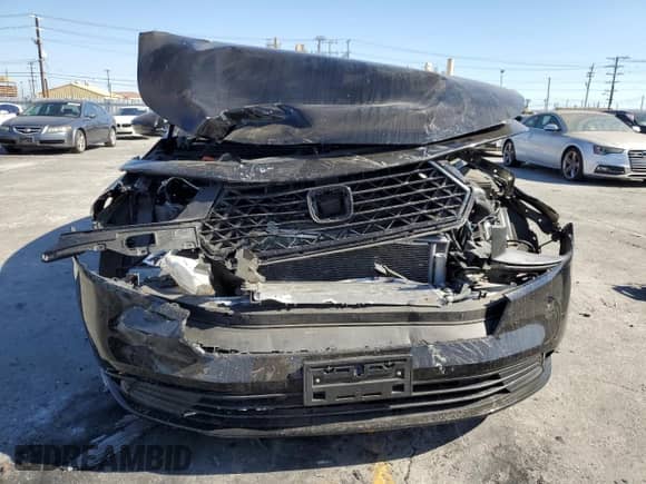 2024 Honda Accord Sport-L with VIN 1HGCY2F70RA023695, listed as a Copart auction lot 71504205 with 58,790 mi miles and Salvage title. Bid and sale history available at DreamBid. Image 5.