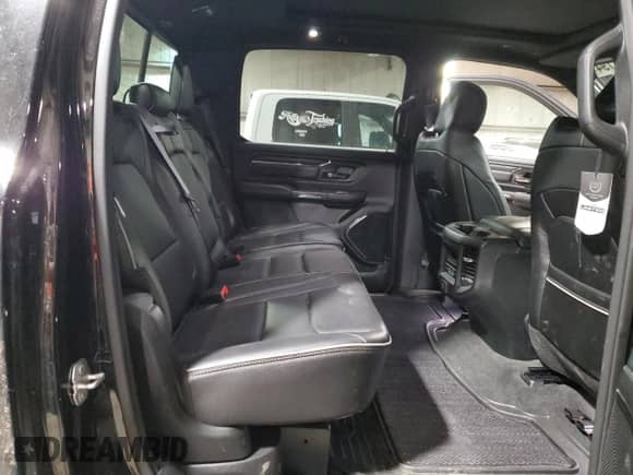 2023 Ram 1500 Limited с VIN 1C6SRFHM0PN505484, выставлен на аукционе Copart как лот 58644194 с пробегом 7 908 миль миль и Списание • Salvage title. История ставок и продаж доступна на DreamBid. Изображение 10.