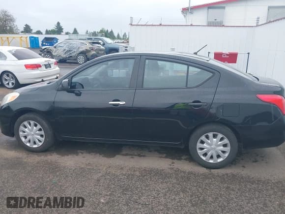 ✅ 2012 Nissan Versa SV • VIN: 3N1CN7AP1CL814932 • Lot: 42272722. Listed on IAAI with 137,349 mi. Free auction sales archive from the USA and detailed vehicle history report at DreamBid. Image 14.