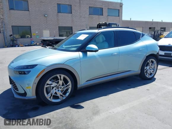 ✅ 2023 Genesis GV60 Performance • VIN: KMUKEDTB0PU002930 • Lot: 42689223. Wystawiony na IAAI z przebiegiem 20 044 mil. Bezpłatny archiwum sprzedaży aukcyjnych z USA i szczegółowy raport historii pojazdu na DreamBid. Zdjęcie 2.