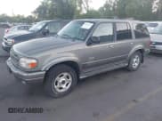 ✅ 1999 Ford Explorer XLT • VIN: 1FMDU34E8XZB70119 • Лот: 42652636. Опубликован ранее на IAAI с пробегом 209 976 миль. Бесплатный доступ к архиву аукционных продаж из США и подробный отчёт об истории автомобиля на DreamBid. Изображение 2.