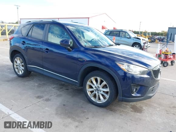 ✅ 2014 Mazda CX-5 Grand Touring • VIN: JM3KE4DY7E0376694 • Lot: 43606054. Listed on IAAI with 155,652 mi. Free auction sales archive from the USA and detailed vehicle history report at DreamBid. Image 1.