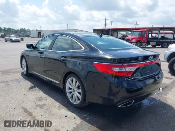 ✅ 2013 Hyundai Azera • VIN: KMHFH4JG0DA310957 • Лот: 42451780. Опубликован ранее на IAAI с пробегом 82 827 миль. Бесплатный доступ к архиву аукционных продаж из США и подробный отчёт об истории автомобиля на DreamBid. Изображение 3.