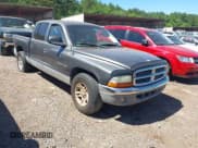 ✅ 2001 Dodge Dakota Sport • VIN: 1B7HL2ANX1S297770 • Lot: 42309715. Wystawiony na IAAI z przebiegiem 279 458 mil. Bezpłatny archiwum sprzedaży aukcyjnych z USA i szczegółowy raport historii pojazdu na DreamBid. Zdjęcie 1.