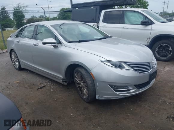 ✅ 2013 Lincoln MKZ • VIN: 3LN6L2J91DR800981 • Lot: 42428215. Wystawiony na IAAI z przebiegiem 106 813 mil. Bezpłatny archiwum sprzedaży aukcyjnych z USA i szczegółowy raport historii pojazdu na DreamBid. Zdjęcie 1.