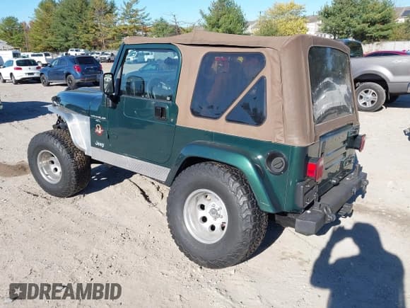 ✅ 2001 Jeep Wrangler Sahara • VIN: 1J4FA59S31P362769 • Лот: 43488240. Опубликован ранее на IAAI с пробегом 178 182 миль. Бесплатный доступ к архиву аукционных продаж из США и подробный отчёт об истории автомобиля на DreamBid. Изображение 3.