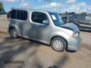 ✅ 2009 Nissan Cube S • VIN: JN8AZ28R99T106634 • Lot: 42929559. Wystawiony na IAAI z przebiegiem 228 284 mil. Bezpłatny archiwum sprzedaży aukcyjnych z USA i szczegółowy raport historii pojazdu na DreamBid. Zdjęcie 1.