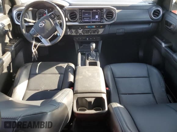 ✅ 2023 Toyota Tacoma Limited • VIN: 3TYGZ5AN7PT116688 • Лот: 71136335. Опубликован ранее на Copart с пробегом 26 666 миль. Бесплатный доступ к архиву аукционных продаж из США и подробный отчёт об истории автомобиля на DreamBid. Изображение 8.