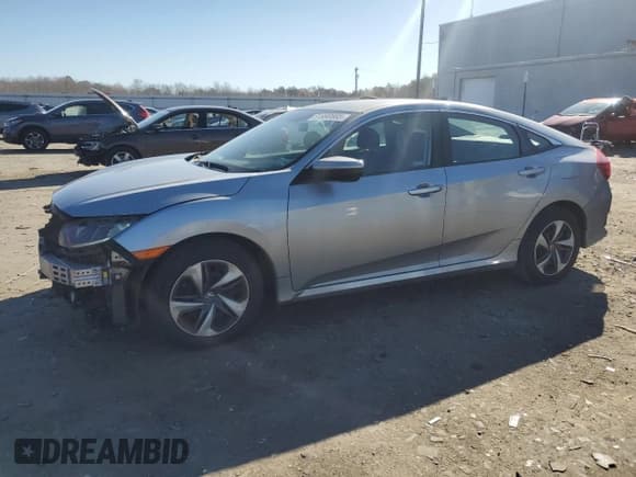 ✅ 2019 Honda Civic LX • VIN: 19XFC2F67KE024007 • Лот: 91990665. Опубликован ранее на Copart с пробегом 127 119 миль. Бесплатный доступ к архиву аукционных продаж из США и подробный отчёт об истории автомобиля на DreamBid. Изображение 1.