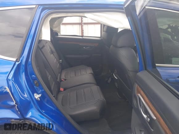 ✅ 2021 Honda CR-V Touring • VIN: 7FARW2H93ME003460 • Lot: 42407842. Listed on IAAI with 32,341 mi. Free auction sales archive from the USA and detailed vehicle history report at DreamBid. Image 8.