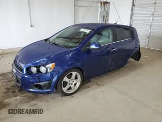 ✅ 2013 Chevrolet Sonic LTZ • VIN: 1G1JE6SB8D4223594 • Lot: 55657765. Listed on Copart with 180,407 mi. Free auction sales archive from the USA and detailed vehicle history report at DreamBid. Image 1.
