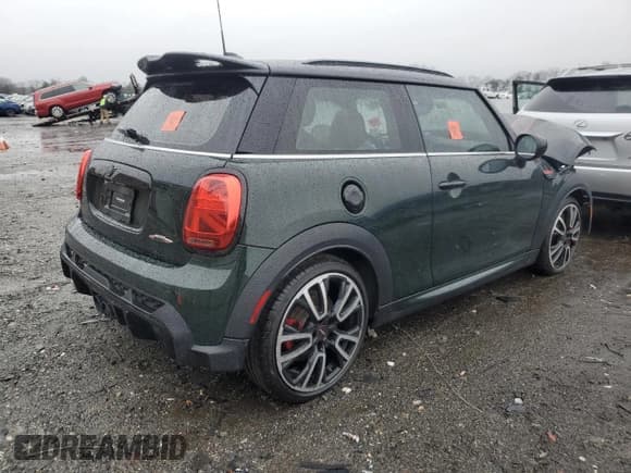 ✅ 2023 MINI Hardtop John Cooper Works • VIN: WMW73DH05P2S75652 • Лот: 43662665. Опубликован ранее на Copart с пробегом 33 897 миль. Бесплатный доступ к архиву аукционных продаж из США и подробный отчёт об истории автомобиля на DreamBid. Изображение 3.