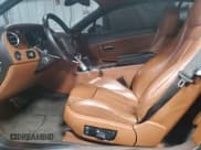 ✅ 2004 Bentley Continental GT GT • VIN: SCBCR63W14C021260 • Lot: 67277464. Wystawiony na Copart z przebiegiem 27 298 mil. Bezpłatny archiwum sprzedaży aukcyjnych z USA i szczegółowy raport historii pojazdu na DreamBid. Zdjęcie 7.