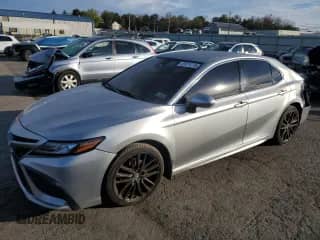 2022 Toyota Camry XSE with VIN 4T1K61AK5NU013156, listed as a Copart auction lot 85874215 with 100,320 mi miles and Salvage title. Bid and sale history available at DreamBid. Image 1.