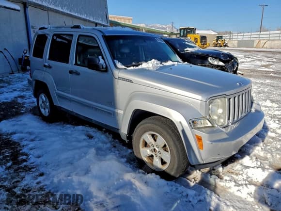 ✅ 2011 Jeep Liberty Sport Jet • VIN: 1J4PN2GK2BW558753 • Lot: 95178895. Listed on Copart with 128,760 mi. Free auction sales archive from the USA and detailed vehicle history report at DreamBid. Image 4.
