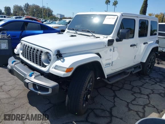 ✅ 2024 Jeep Wrangler Sahara • VIN: 1C4RJXP62RW255492 • Lot: 43407205. Listed on IAAI with 15,649 mi. Free auction sales archive from the USA and detailed vehicle history report at DreamBid. Image 2.
