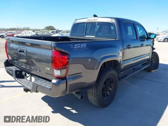 ✅ 2023 Toyota Tacoma SR • VIN: 3TYCZ5AN1PT146719 • Lot: 41406963. Listed on IAAI with 19,735 mi. Free auction sales archive from the USA and detailed vehicle history report at DreamBid. Image 4.