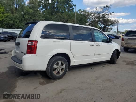 2009 Dodge Grand Caravan SE with VIN 1D8HN44E59B517704, listed as a Copart auction lot 70109925 with 113,322 mi miles and Salvage title. Bid and sale history available at DreamBid. Image 3.