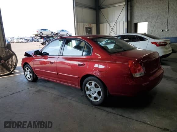 2003 Hyundai Elantra GLS with VIN KMHDN45D53U706119, listed as a Copart auction lot 68493304 with 132,529 mi miles and Salvage title. Bid and sale history available at DreamBid. Image 2.
