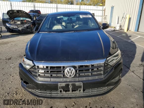 ✅ 2021 Volkswagen Jetta S • VIN: 3VWC57BU9MM053061 • Lot: 87047475. Wystawiony na Copart z przebiegiem 124 642 mil. Bezpłatny archiwum sprzedaży aukcyjnych z USA i szczegółowy raport historii pojazdu na DreamBid. Zdjęcie 5.