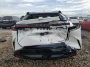 ✅ 2024 Lexus RZ 450e Premium • VIN: JTJAAAAB8RA023618 • Lot: 43230375. Listed on Copart with 8,307 mi. Free auction sales archive from the USA and detailed vehicle history report at DreamBid. Image 6.