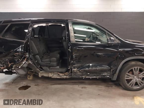 ✅ 2021 Honda Passport EX-L • VIN: 5FNYF8H54MB036555 • Lot: 42493765. Listed on IAAI with 61,454 mi. Free auction sales archive from the USA and detailed vehicle history report at DreamBid. Image 14.