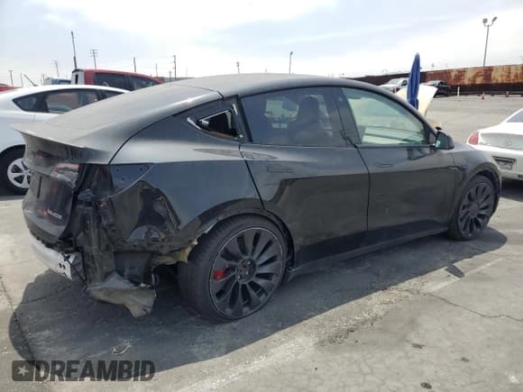 ✅ 2022 Tesla Model Y Performance • VIN: 7SAYGDEF1NF484582 • Lot: 59596305. Listed on Copart with 7,611 mi. Free auction sales archive from the USA and detailed vehicle history report at DreamBid. Image 3.