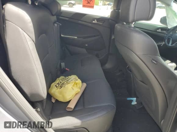 2018 Hyundai Tucson Limited z VIN KM8J33A23JU814937, wystawiony jako Copart lot #82202515 z przebiegiem 97 220 mil mil oraz Szkoda całkowita • Salvage title. Historia ofert i sprzedaży dostępna na DreamBid. Obrazek 11.