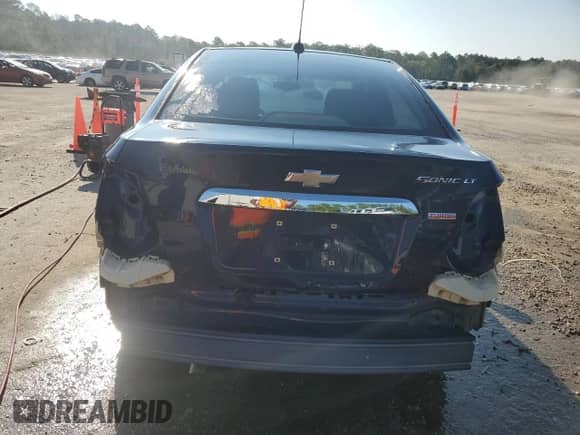 2016 Chevrolet Sonic LT с VIN 1G1JC5SB0G4182317, выставлен на аукционе Copart как лот 67920034 с пробегом 55 678 миль миль и Списание • Salvage title. История ставок и продаж доступна на DreamBid. Изображение 6.