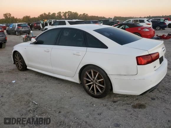 ✅ 2018 Audi A6 Premium Plus • VIN: WAUG8AFC6JN015182 • Лот: 90880355. Опубликован ранее на Copart с пробегом 89 363 миль. Бесплатный доступ к архиву аукционных продаж из США и подробный отчёт об истории автомобиля на DreamBid. Изображение 2.