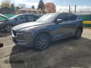 ✅ 2018 Mazda CX-5 Grand Touring • VIN: JM3KFBDMXJ0375578 • Lot: 89924145. Listed on Copart with 74,460 mi. Free auction sales archive from the USA and detailed vehicle history report at DreamBid. Image 1.