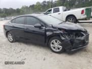 ✅ 2018 Chevrolet Cruze LT • VIN: 1G1BE5SM8J7242236 • Lot: 49886043. Listed on Copart with 65,872 mi. Free auction sales archive from the USA and detailed vehicle history report at DreamBid. Image 4.