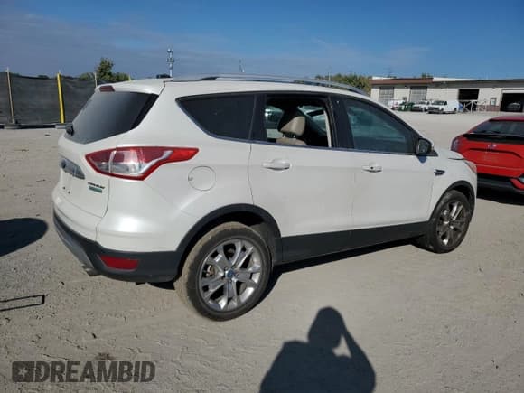 ✅ 2014 Ford Escape Titanium • VIN: 1FMCU0JX9EUA28520 • Лот: 82393815. Опубликован ранее на Copart с пробегом 136 413 миль. Бесплатный доступ к архиву аукционных продаж из США и подробный отчёт об истории автомобиля на DreamBid. Изображение 3.
